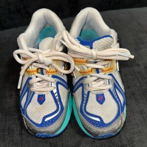 Kids White and Blue Athletic Sneakers with Teal Accents